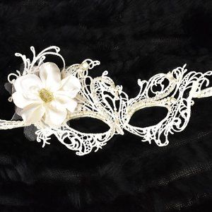 Hand beaded mask with satin flower accent